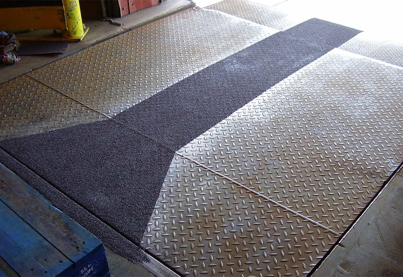 Plant walkway resurfaced with an anti-slip safety floor