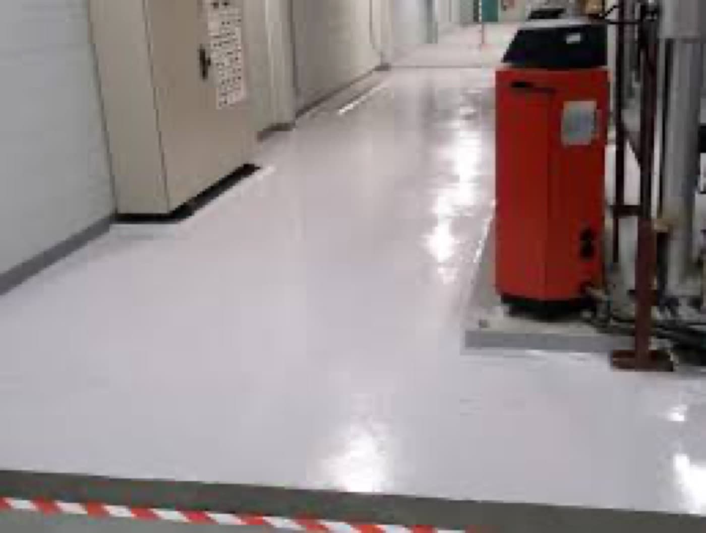 Chemical-resistant process floor repaired and resurfaced in a sugar mill