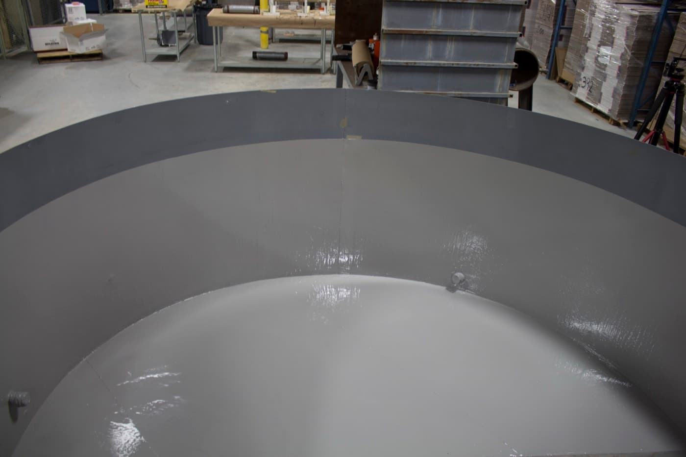 Floor and wall lining applied to hold back water and treatment chemistry
