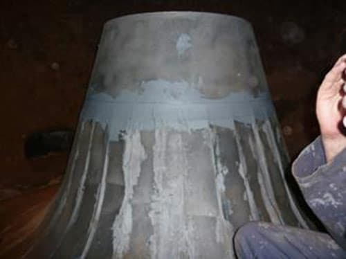 Steel plates bonded over damaged area using Belzona