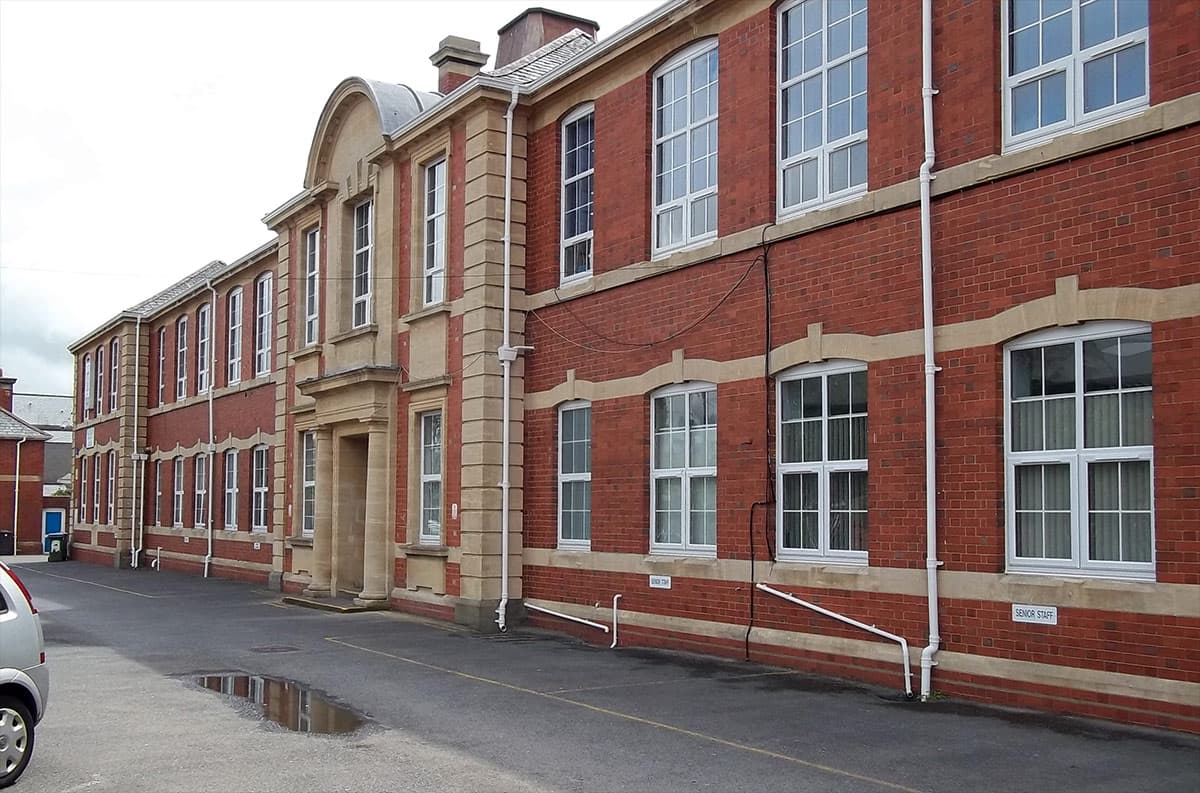 School building wall restored and protected with Belzona 5122 (Clear Cladding Concentrate)