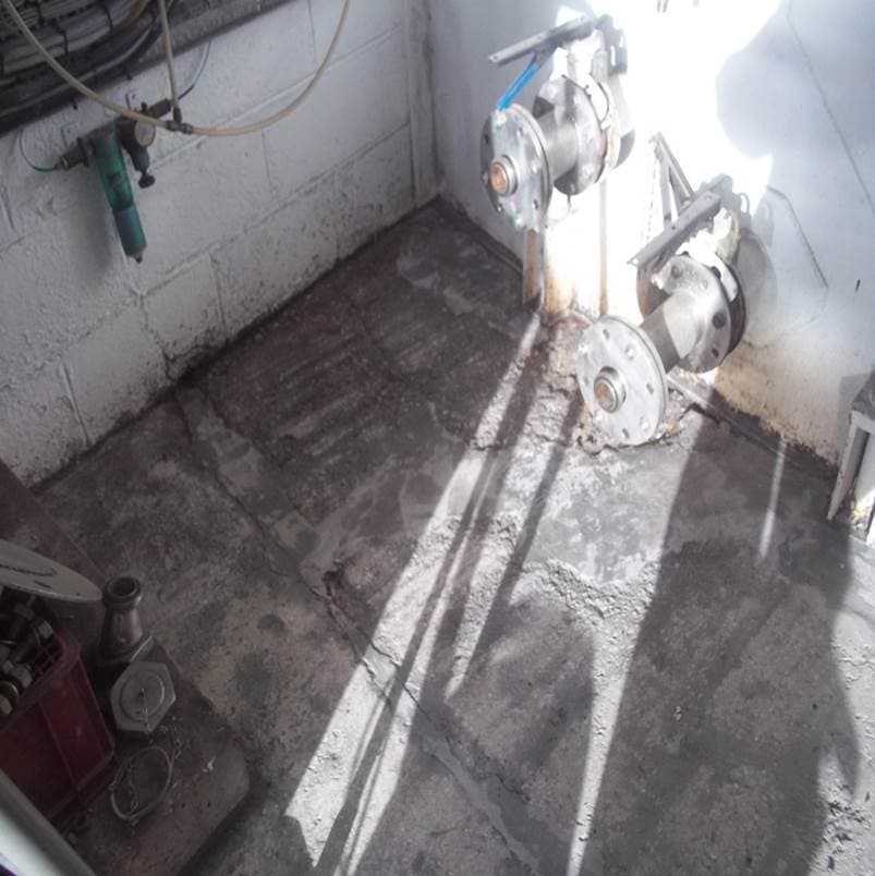 Cider manufacturer floor requiring refurbishment