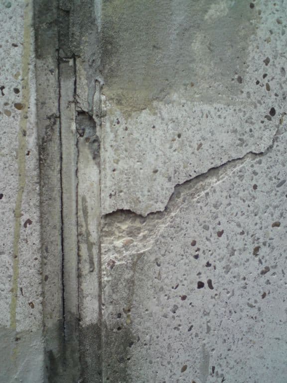 Cracked concrete chimney stack