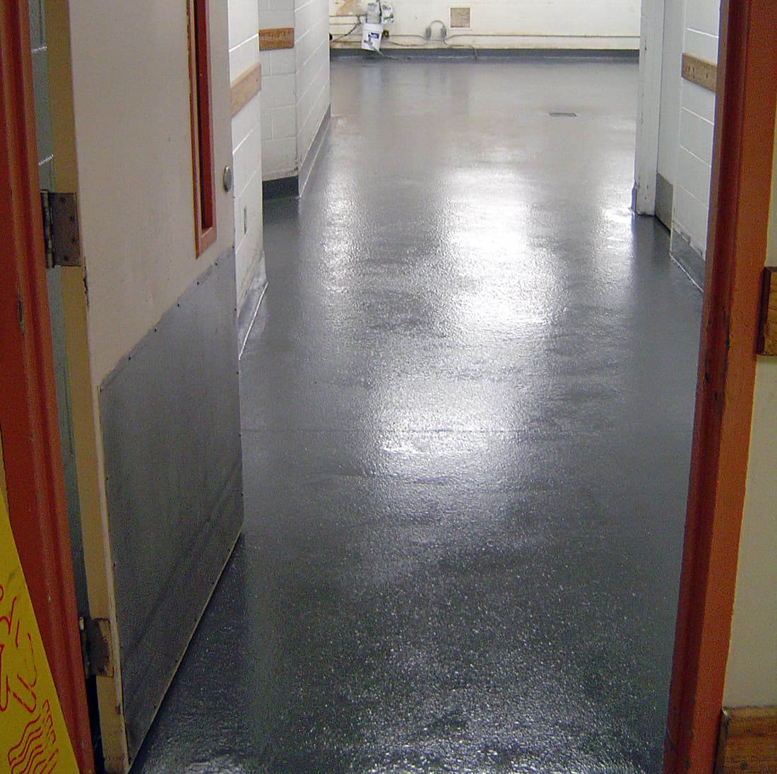 Kitchen washroom floor repaired and protected from deterioration using Belzona 4111 (Magma-Quartz)