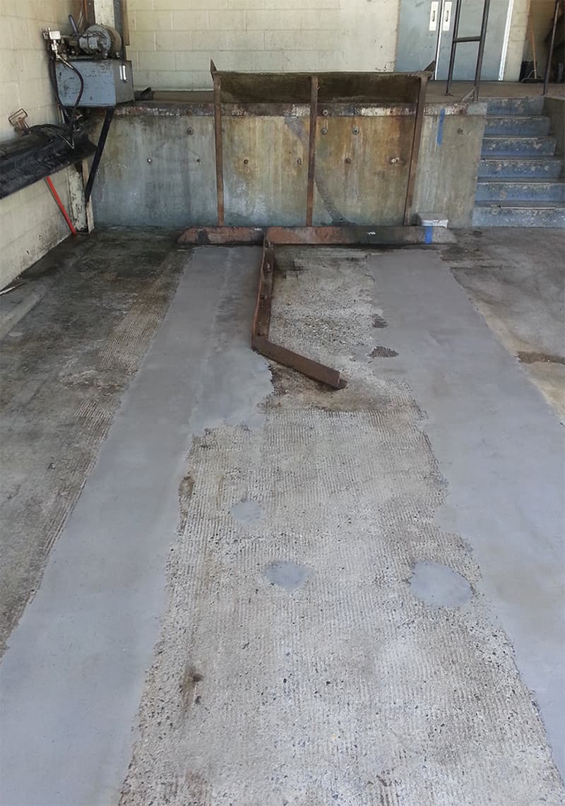 Deteriorated concrete of an unloading area repaired with Belzona 4124 and overcoated with Belzona 4131