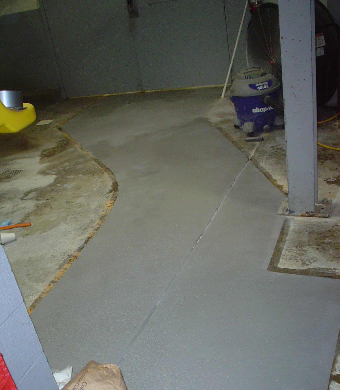 Two coats of Belzona 4151 (Magma-Quartz Resin) with a colored aggregate applied