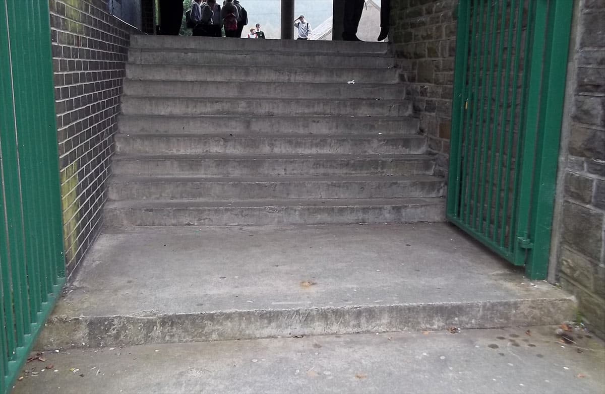 Deteriorating steps at the entrance to the school